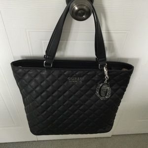Beautiful black Guess bag.